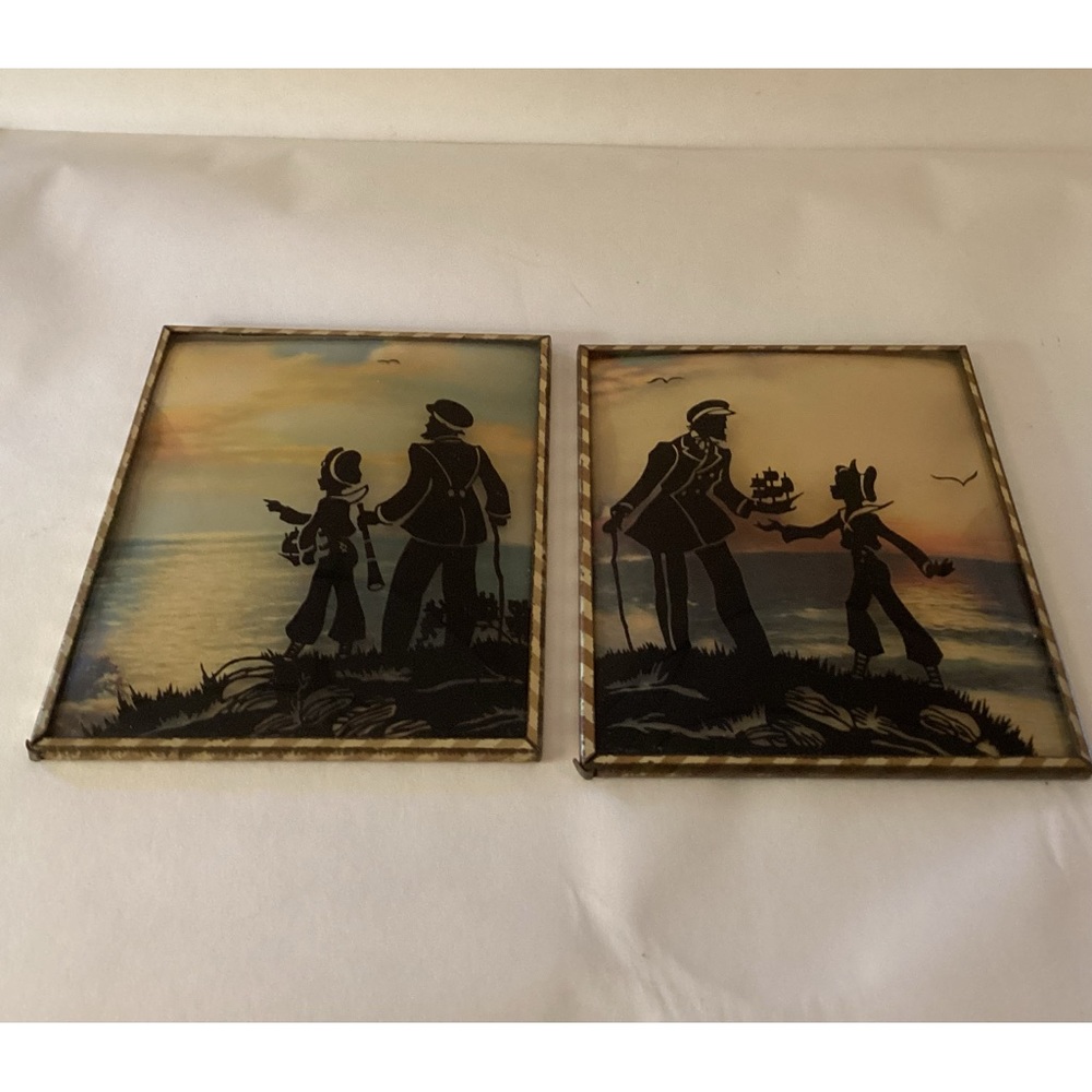 Pair of vintage silhouettes with coved glass